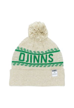 Berretto lavorato a maglia color crema con il logo verde "DJINNS", motivo a fiocchi di neve e una pompon soffice in cima. Presenta un orlo ripiegato e testurizzato.