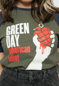 Paradiso Clothing Green Day American Idiot Raglan - Print T-shirt - green