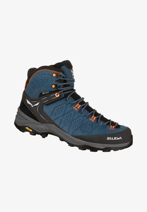 Blue hiking boot with suede and mesh upper, orange accents, black rubber sole, and Vibram branding. Features a high cut for ankle support.