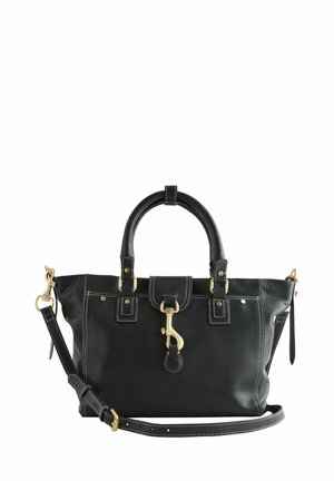 Zwarte leren handtas met dubbele handvaten, afneembare schouderband, gouden hardware, contrasterende stiksels en een sluitingdetail aan de voorkant.