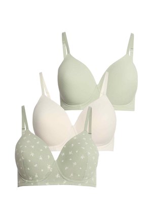 Cuatro sujetadores inalámbricos en beige y verde claro, con tirantes ajustables; uno de los sujetadores verde claro presenta un pequeño patrón floral.