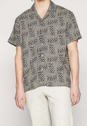 Kurzarmhemd in einem hellbeige-schwarzen Muster mit rechteckigen und ovalen Formen, mit spread Kragen und Knopfverschluss.