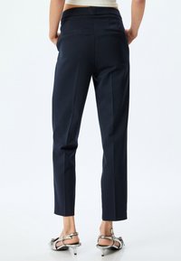 Koton CIGARETTE PANTS - Pantalon classique - black