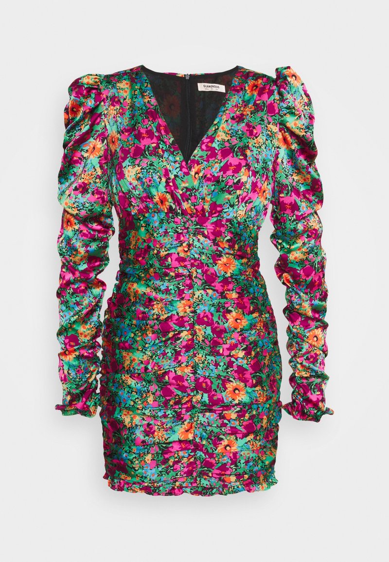 Robe courte fleurie présentant des motifs multicolores vibrants, des manches longues bouffantes et une texture froncée, avec un décolleté en V et une fermeture éclair au dos.