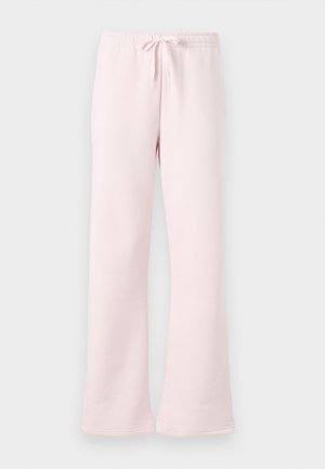 Pantalons de survêtement rose clair en tissu doux, dotés d'une taille élastique avec cordon de serrage et d'une coupe évasée.