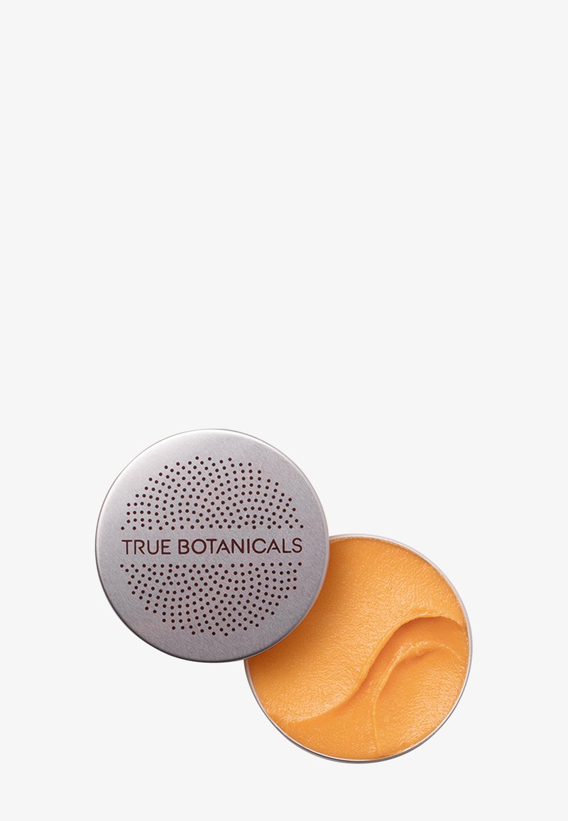 Rundes, silbernes Metallbehältnis mit Belüftungsöffnungen. Der Deckel ist mit "TRUE BOTANICALS" beschriftet. Enthält ein glattes, cremiges, orangefarbenes Produkt.