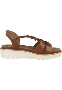 Braune Leder-Sandale mit geflochtenem Riemen und dekorativen goldenen Akzenten, ausgestattet mit einer gepolsterten Fußbett und einer weißen Plattformsohle mit strukturiertem Boden.