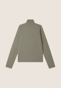 Veste kaki à manches longues avec une coupe droite, col montant, texture lisse, et sans aucune quincaillerie ou embellissements visibles au dos.