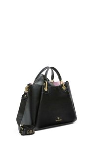 Borsa in pelle nera con hardware dorato, doppi manici e tracolla regolabile. Presenta un interno rosa e il logo del marchio sulla parte anteriore.