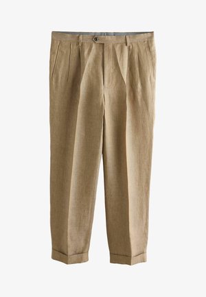 Beige geplooide broek met steekzakken, knoopsluiting, omgeslagen zomen en een getailleerde pasvorm.
