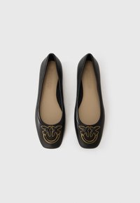Black leather ballet flats with square toes and gold bird-shaped embellishments on the front, labeled "PINKO" inside.