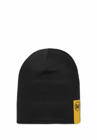 Black knit beanie with a rounded top, featuring a yellow rectangular label with a black logo on the side. Soft texture, simple design.