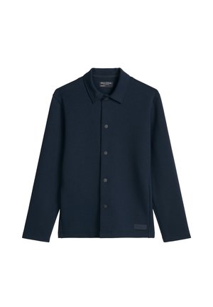 Granatowa, długorękawowa koszula-kurtka na guziki z kołnierzem, pięcioma czarnymi zatrzaskami oraz małą metką na dolnej części przodu.