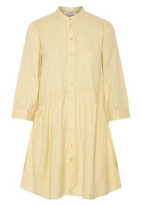 Gelbes Hemdkleid mit hohem Kragen, langen Ärmeln und geraffter Taille. Hergestellt aus leichtem Stoff, mit dezentem Strukturmuster und glänzenden Knöpfen.