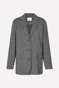 Blazer texturé gris avec un col cranté, trois boutons et deux poches avant. Fabriqué en tissu tissé avec une silhouette structurée.