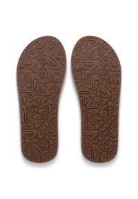 Καφέ λαστιχένιες εσωτερικές σόλες με υφή από γεωμετρικά σχήματα. Σχεδιασμός σε επίπεδο με στρογγυλεμένες άκρες για άνεση και υποστήριξη.