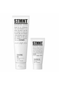 Two white tubes of STMTN Shaving Gel, one large (150 ml) and one small (30 ml), featuring minimalist black text and simple designs.