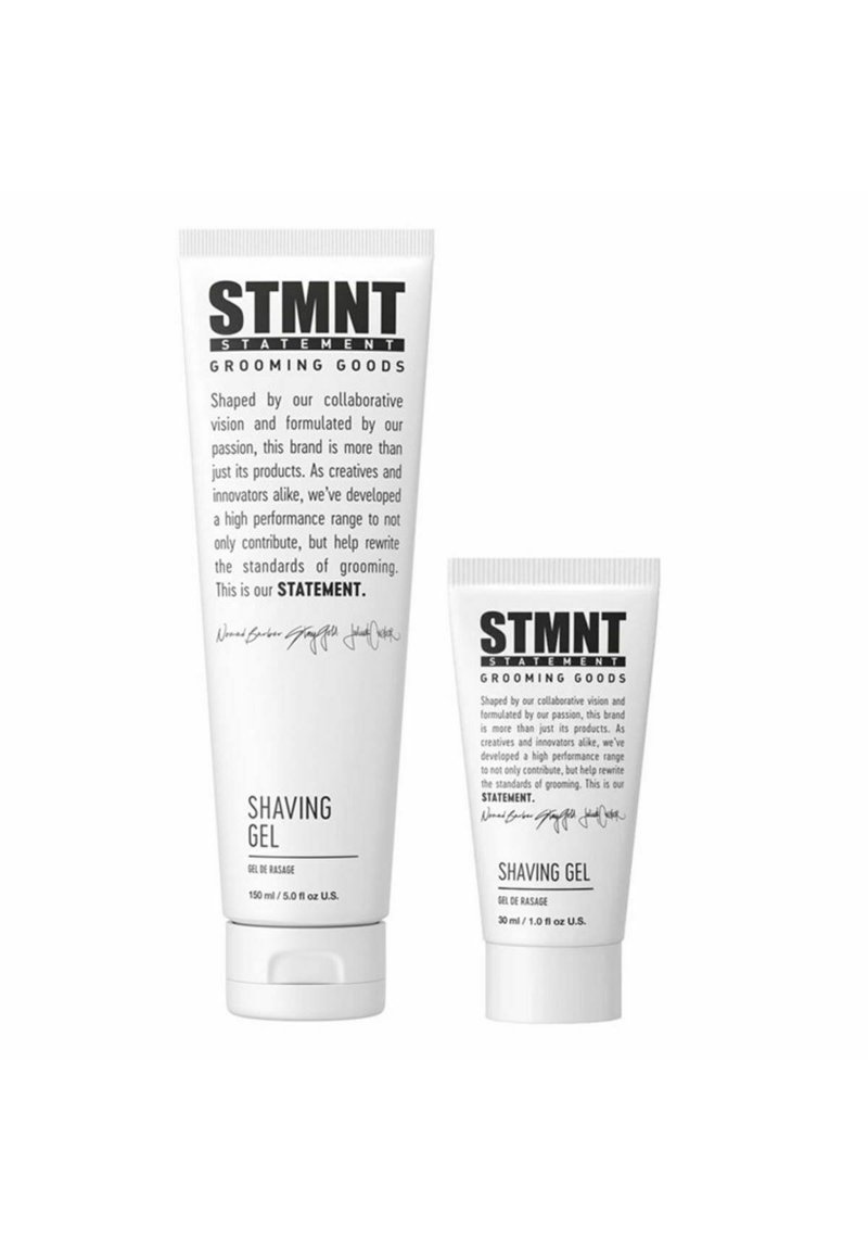 Two white tubes of STMTN Shaving Gel, one large (150 ml) and one small (30 ml), featuring minimalist black text and simple designs.
