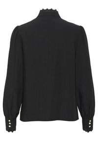 Black blouse with puff sleeves, a scalloped neckline, and lace trim at cuffs. Features three button details on each sleeve.