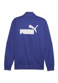 Kék pályázsák, bordázott gallérral és mandzsettával. Nagy fehér Puma-logó és macska sziluett található a hátsó részen. Simas szövet textura.