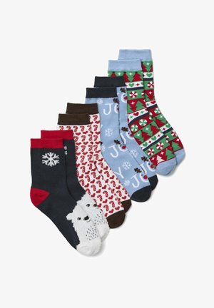 Zes paar sokken in verschillende kleuren en ontwerpen. Inclusief patronen van sneeuwvlokken, zuurstokken en kerstbomen. Zacht gebreid materiaal.