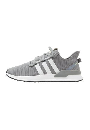 Grey athletic sneaker with white sole and three white stripes on the side, featuring mesh fabric and lace-up closure.