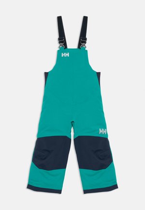 Teal and navy waterproof bib pants with adjustable black shoulder straps and Helly Hansen logos on chest and thigh.