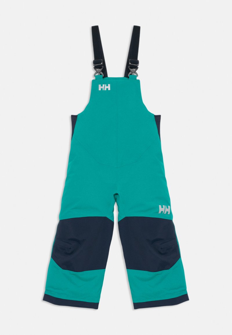 Teal og marineblå vanntette bibbukser med justerbare svarte skulderstropper og Helly Hansen-logoer på brystet og låret.