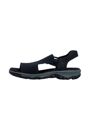 Sandale noire à bout ouvert avec empeigne en tissu texturé, brides latérales élastiques, semelle amortissante et semelle extérieure en caoutchouc robuste pour une utilisation en extérieur.