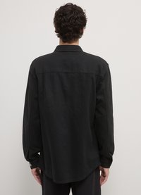 Calliope DE TRAVAIL UNIE - Camicia - noir