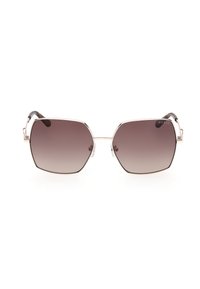 Lunettes de soleil à verres dégradés bruns hexagonaux avec une fine monture en métal argenté et des branches en écaille de tortue, logo Guess sur le verre supérieur droit.