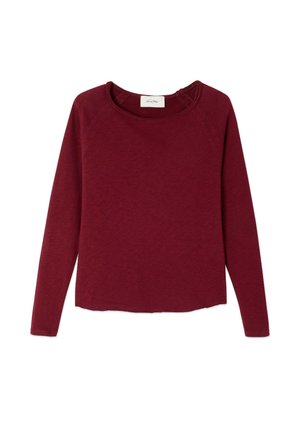 Bordeaux lange mouw shirt met een ronde hals. Gemaakt van zachte, gestructureerde stof; heeft raglanmouwen en een rechte snit aan de onderkant.