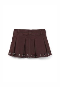 Jupe plissée marron avec des œillets en métal le long de l'ourlet. Fabriquée en tissu texturé, elle est dotée d'une taille avec passants de ceinture.