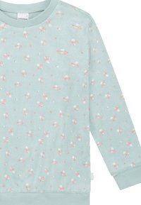 Lichtblauwe pullover sweatshirt met een zachte textuur. Heeft een verspreid bloemenpatroon in roze en wit, met ribgebreide halslijn en manchetten.