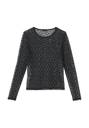 Haut noir à manches longues en matière transparente, avec un motif floral sur l'ensemble et un col rond à finition texturée.