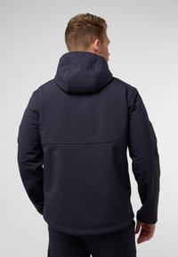 Veste à capuche bleu marine foncé en tissu doux, avec une texture lisse et un design simple. La vue de dos montre un encolure épurée et des détails de couture.
