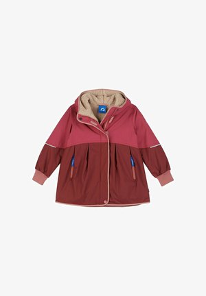 Rote und kastanienbraune Jacke mit einem weichen beigen Fleecefutter, Kapuze, elastischen Bündchen und zwei Fronttaschen mit blauen Reißverschlüssen.