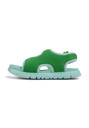 Grön neopren-sandal med utskärningar på sidorna och en mintfärgad gummisula. Har stickade accenter för en texturerad design.