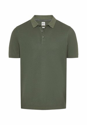 Olive green polo shirt made of textured fabric. Features a collar, three-button placket, and short sleeves. Simple design with no patterns.