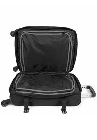 Black wheeled suitcase features a zippered main compartment with a mesh pocket, gray accents, and a retractable handle for easy transport.