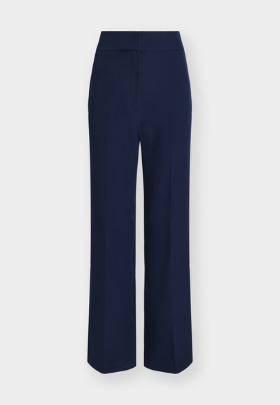 Pantalon large taille haute bleu marine avec fermeture avant dissimulée et coupe ajustée.