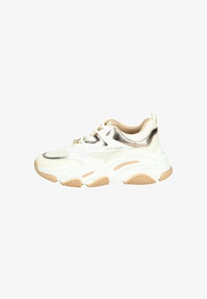 White athletic sneaker with metallic silver accents and beige sole. Features textured fabric, a thick sole, and lace-up closure.