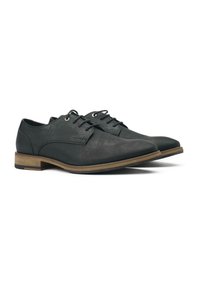 Black leather oxford shoes with rounded toes, lace-up front, and a wooden heel. Textured finish with minimal stitching details.
