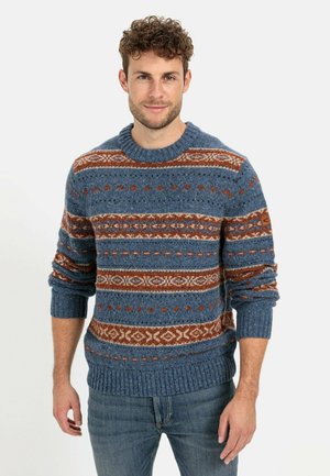 Blue knitted sweater featuring horizontal stripes in brown and cream, with patterned accents. Ribbed cuffs and hem for texture.