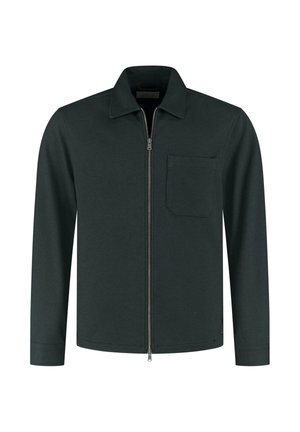 Dark green long-sleeve jacket with front zipper, pointed collar, and a single chest pocket on the left side.