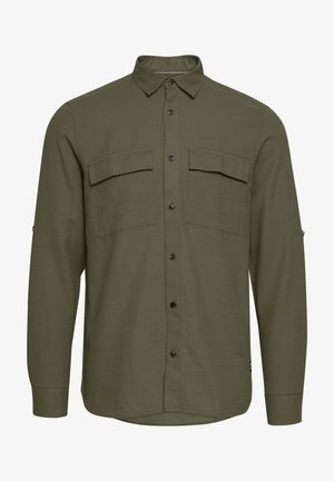 Olijfgroene langearmige shirt met een knoopsluiting aan de voorkant, twee borstzakken en een gebogen zoom. Gemaakt van een textuurstof. Zwarte knopen.