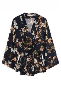 Veste en tissu bleu marine à motifs floraux, dotée d'une ceinture, de manches larges et d'un motif de fleurs blanches et turquoise avec des accents verts.