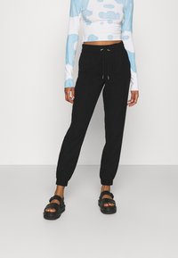 ONLY ONLKELDA EMERY PULL UP - Calças - black