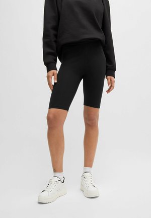 NURSULA - Leggings - Trousers - black one