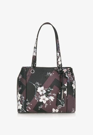 Sac cabas Guess noir et violet foncé avec imprimé floral blanc, doubles anses d'épaule et détail d'étiquette suspendue.